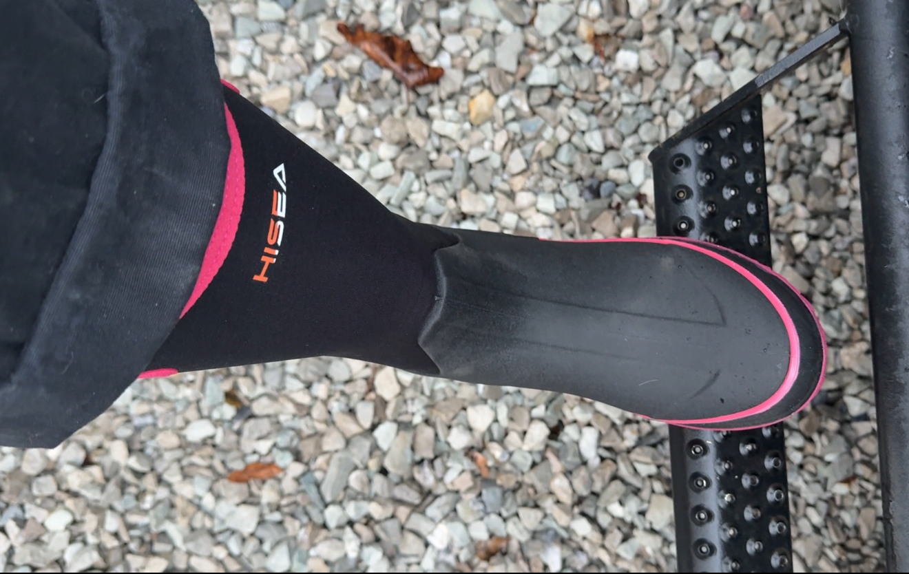 Hisea farm boots worn on a gravel path
