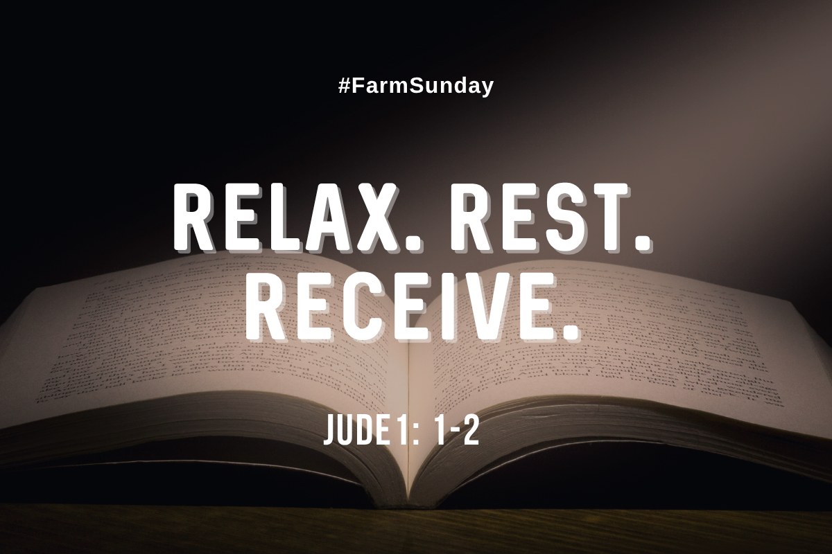 Open Bible on a wooden table in soft light with the words Relax, Rest, Receive and the reference Jude 1:1-2
