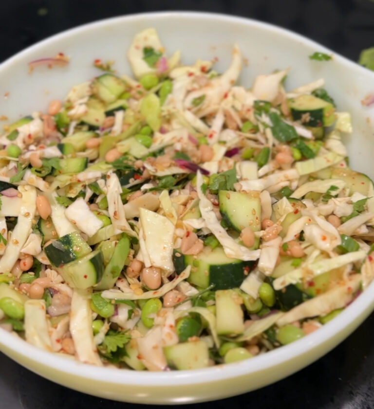 Bowl of white bean and edamame Asian cucumber salad